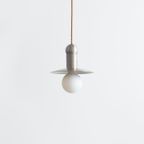 WEB_ORBIT_CORD_PENDANT_NICKEL_STRAIGHT_OFF